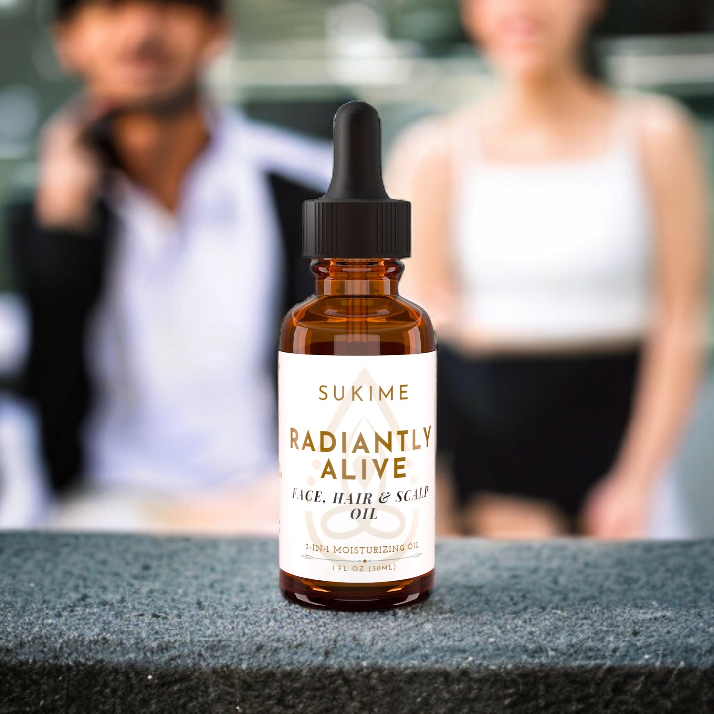 Single bottle of Radiantly Alive Face Oil For Dry Skin and Sensitive Skin and blurred images of an asian couple in background. 