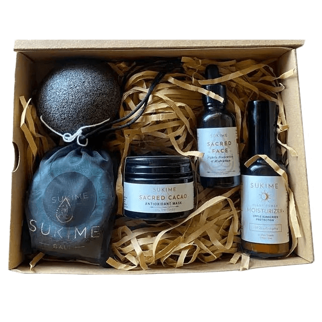 Natural Face Oil, vegan moisturizer with SPF, Cacao  anti-oxidant face mask, and moringa cleaning bar and sponge gift set. 