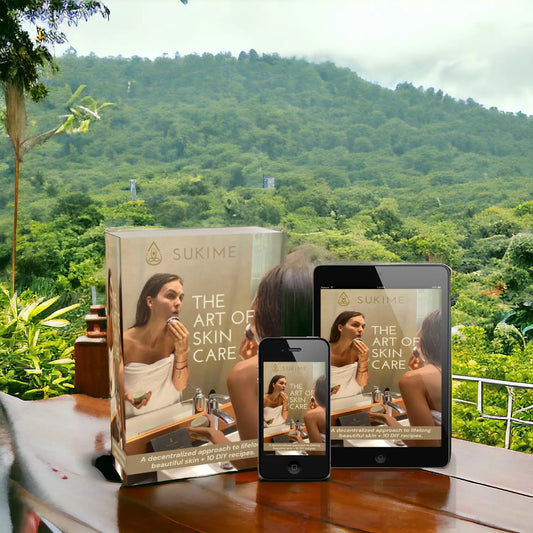 The Art of Skincare mockup Box, Phone and Tablet on wood table with Bali jungle background. 