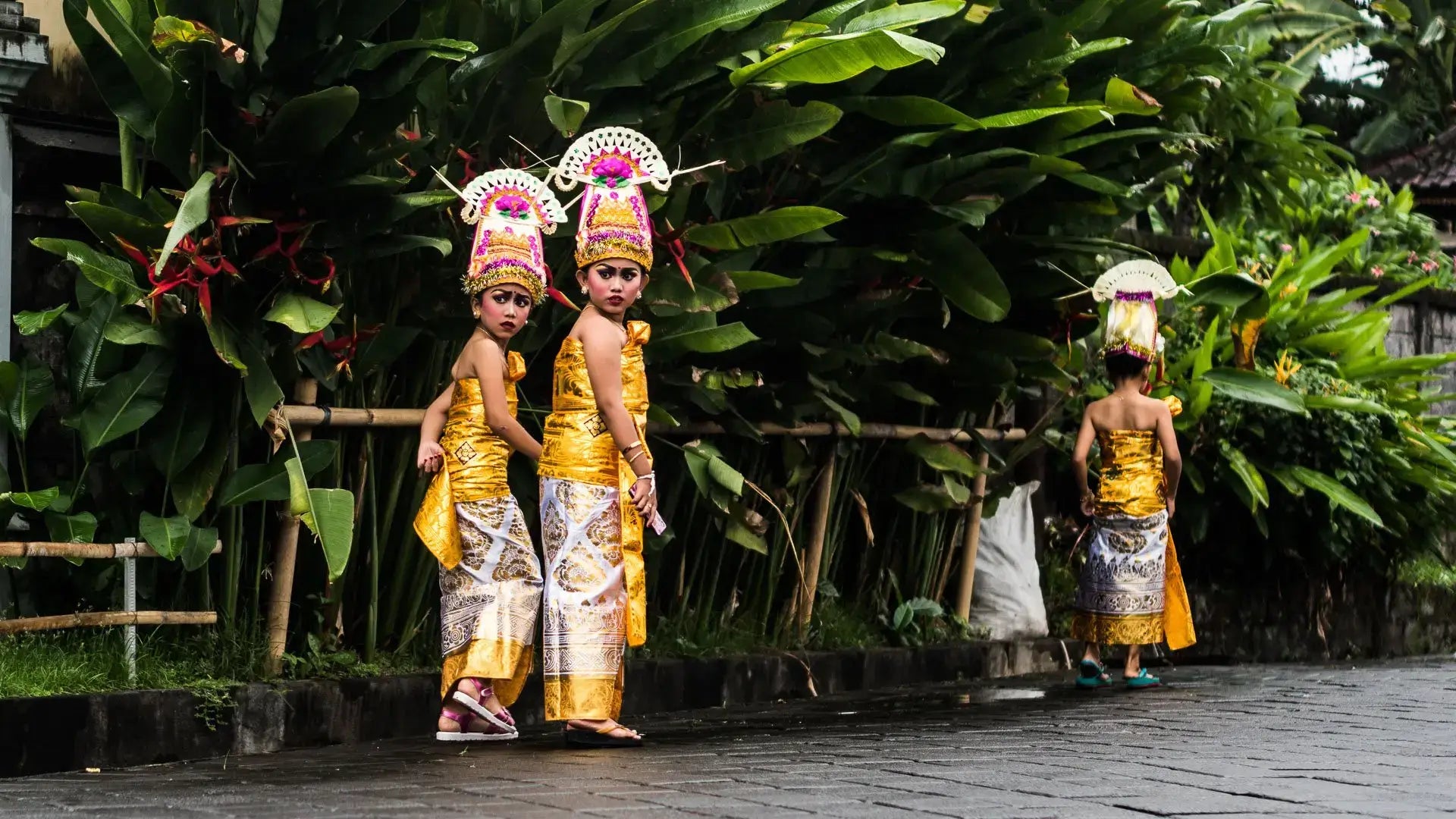 balinese girls in ceremonial dance costumes after show. Bali Vegan Book